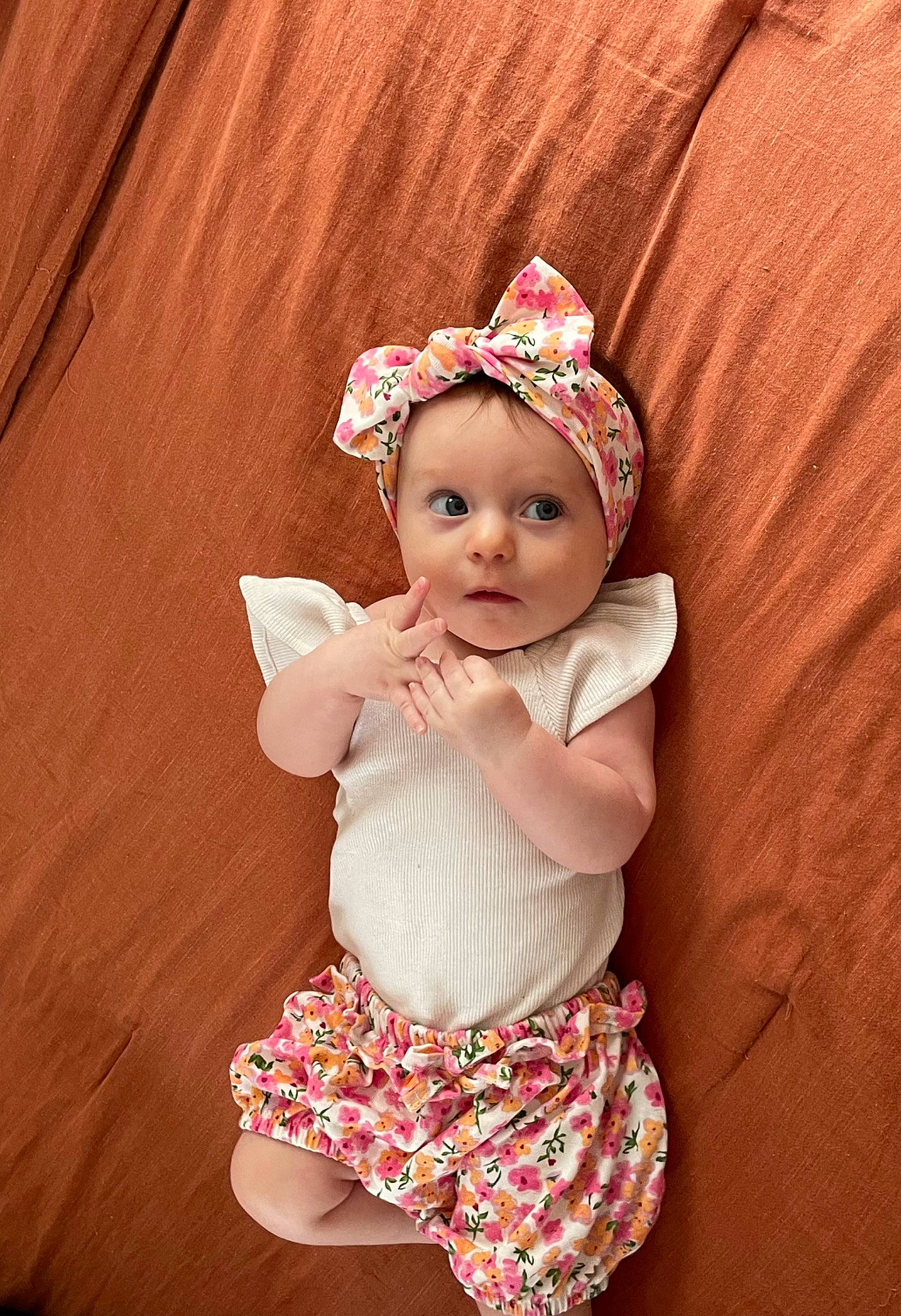Valerie joined the competition — help win amazing prizes! baby, baby_toddler_clothing, child, dress, finger, hand, happy, headband, headgear, headpiece, human_body, lip, magenta, pattern, person, pink, skin, sleeve, textile, thigh