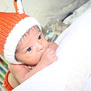 Ivan is registered to the contest to win money with this photo: bonnet, cap, child, hair_accessory, headgear, infant, nose, product, skin, toddler