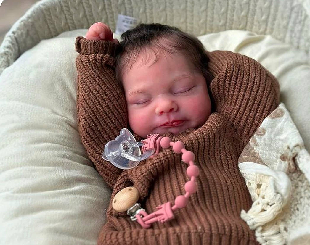 Reign is registered to the contest to win money with this photo: baby, bed, blanket, clothing, document, drivinglicense, face, furniture, head, idcards, knitwear, newborn, person, photography, portrait, sleeping, sweater, text