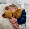 Baïano a rejoint le concours — aidez-le/la à gagner de superbes lots ! baby, bed, blanket, blue_sleeve, child, clothing, comfort, cozy, cute, hand, indoors, nap, peaceful, person, pillow, plush_toy, rest, sleeping, soft_toy, toddler