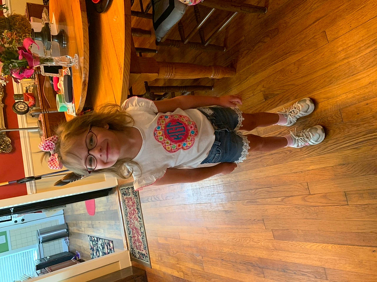 Kenzlie is registered to the contest to win money with this photo: baby_toddler_clothing, building, child, flooring, fun, happy, hardwood, house, joy, laminate_flooring, person, play, plywood, room, shelf, shelving, smile, toddler, varnish, wood