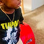 Kross joined the competition — help win amazing prizes! child, toddler, indoor, toy_car, red, t-shirt, tupac, pants, earrings, necklace, carpet, furniture, looking_up, young_child, portrait, casual_clothing, cute, curious, home, play