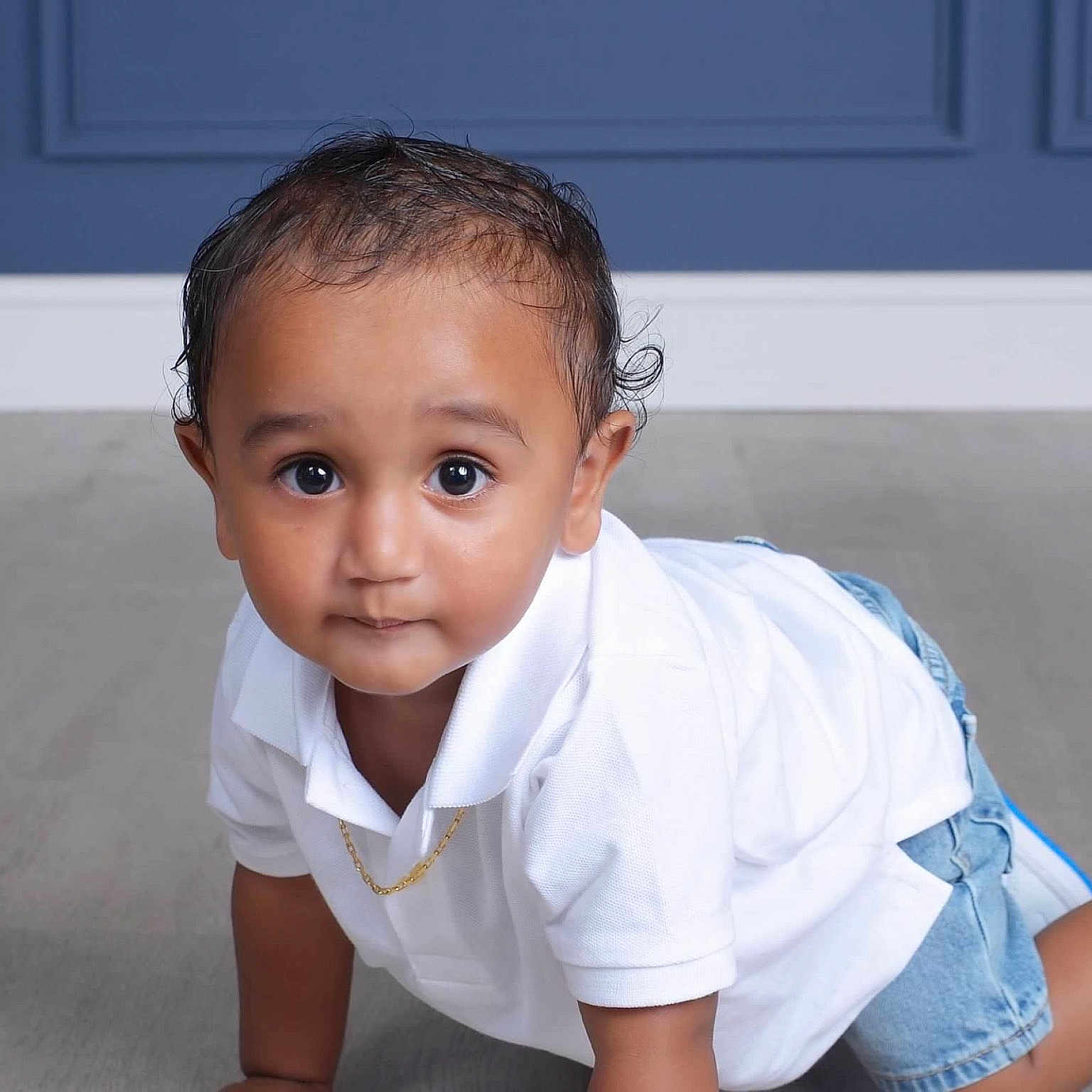 Isaiah is registered to the contest to win money with this photo: accessories, baby, babycrawling, boy, child, crawling, face, head, jewelry, male, necklace, person, photography, portrait