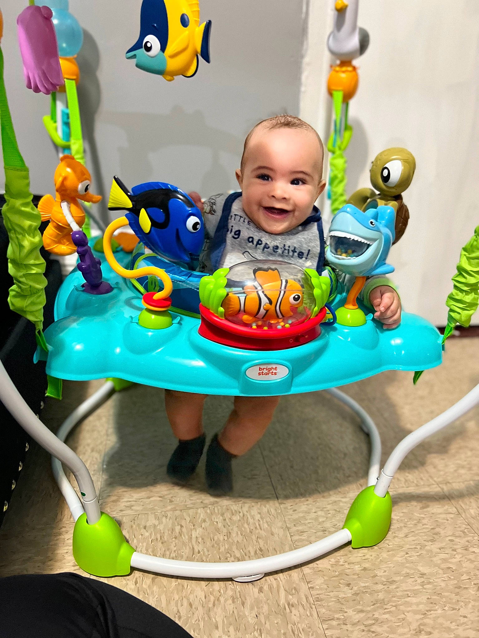 Brian is registered to the contest to win money with this photo: baby, baby_products, baby_toddler_clothing, baby_toys, child, event, fun, grass, green, happy, joy, person, photograph, product, smile, snapshot, sports_toy, tennis_ball, toddler, toy