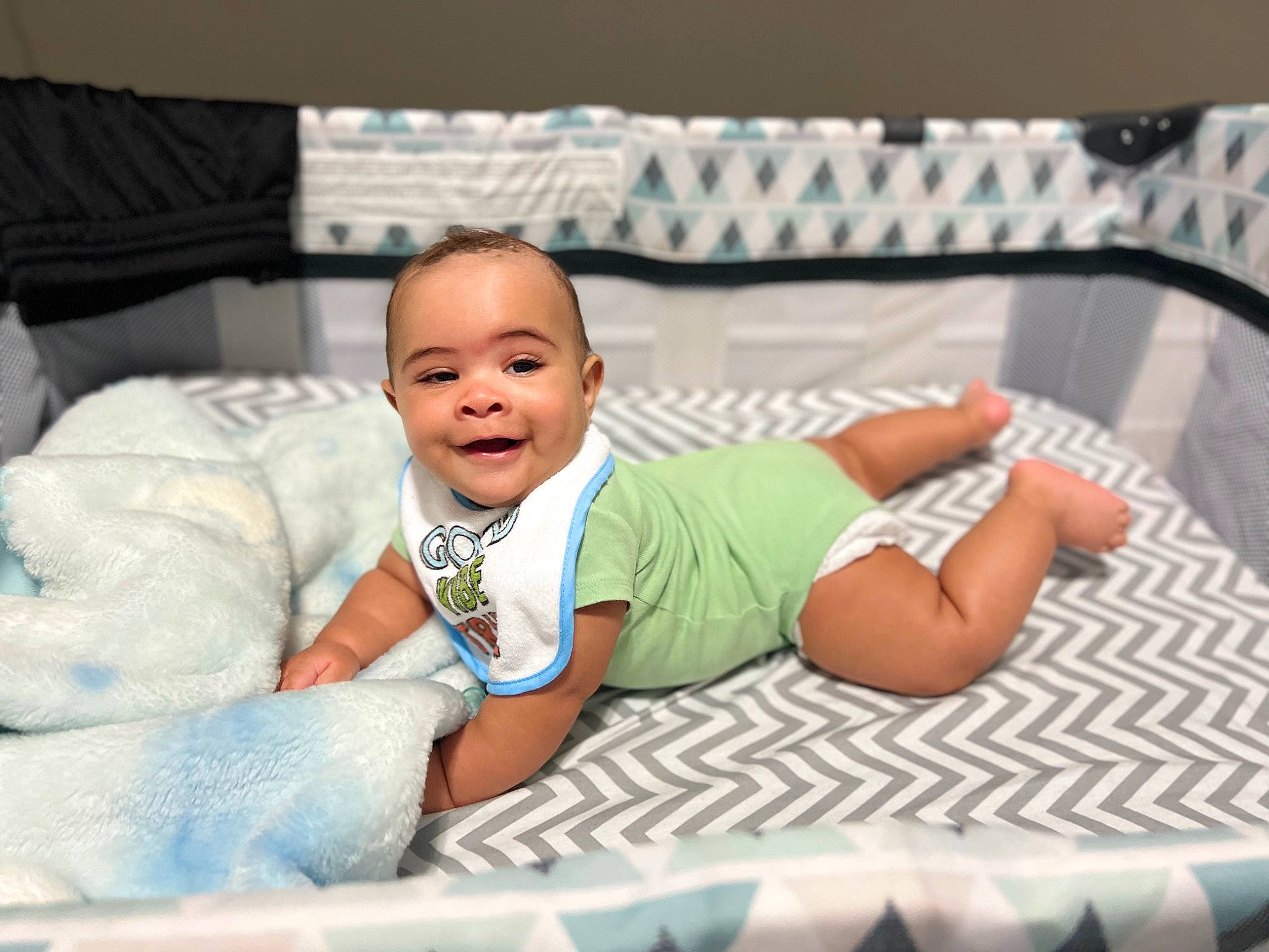 Brian joined the competition — help win amazing prizes! baby, baby_products, baby_toddler_clothing, bedding, child, comfort, couch, event, finger, flooring, happy, joy, leisure, linens, person, room, sitting, smile, t_shirt, textile