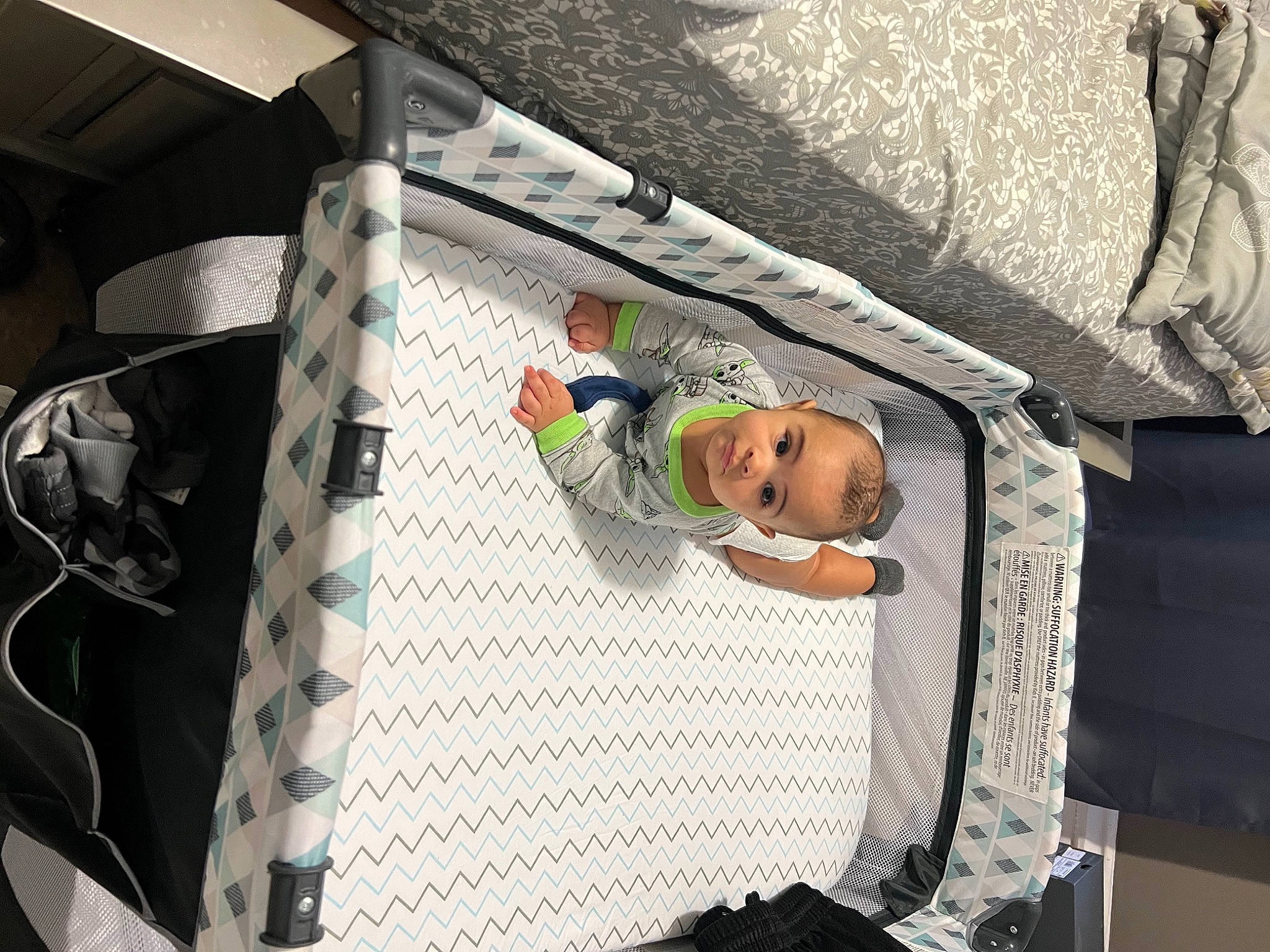 Brian is registered to the contest to win money with this photo: automotive_design, baby, baby_products, child, comfort, couch, flooring, fun, leisure, linens, pattern, person, room, t_shirt, toddler, tree, visual_arts, wood