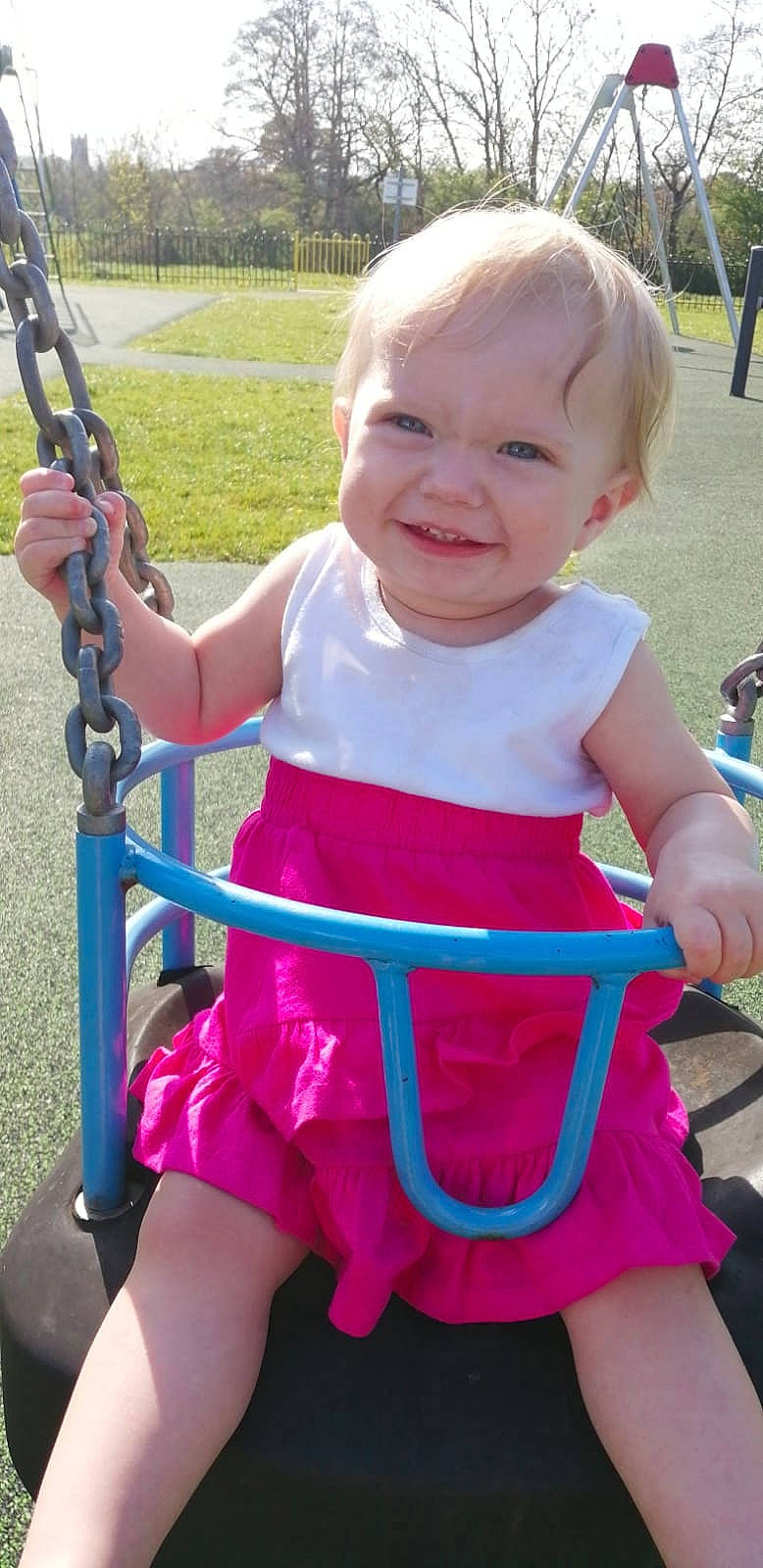 Paige Edworthy Todd joined the competition — help win amazing prizes! child, fun, human_settlement, joy, magenta, outdoor_play_equipment, person, pink, play, playground, public_space, recreation, smile, swing, toddler