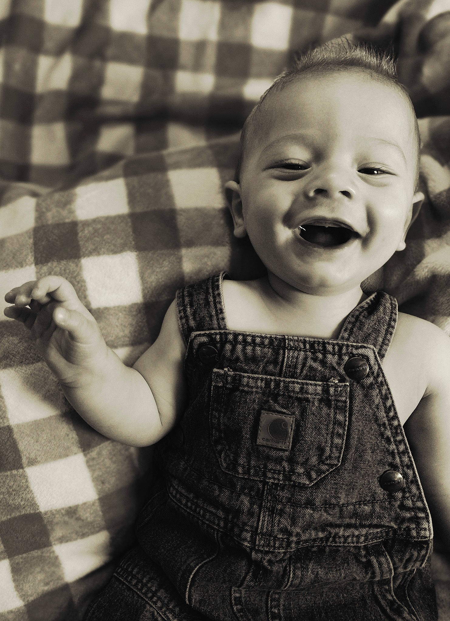 Tegan joined the competition — help win amazing prizes! arm, baby_toddler_clothing, black, cheek, eye, face, facial_expression, finger, flash_photography, gesture, hairstyle, hand, human, iris, person, skin, sleeve, smile, style, tartan