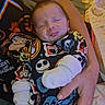 Jackie joined the competition — help win amazing prizes! adult, baby, bed, blanket, cartoon_characters, child, clothing, cozy, cute, hand, holding, indoor, infant, pajamas, pattern, person, portrait, resting, sleep, sleeping