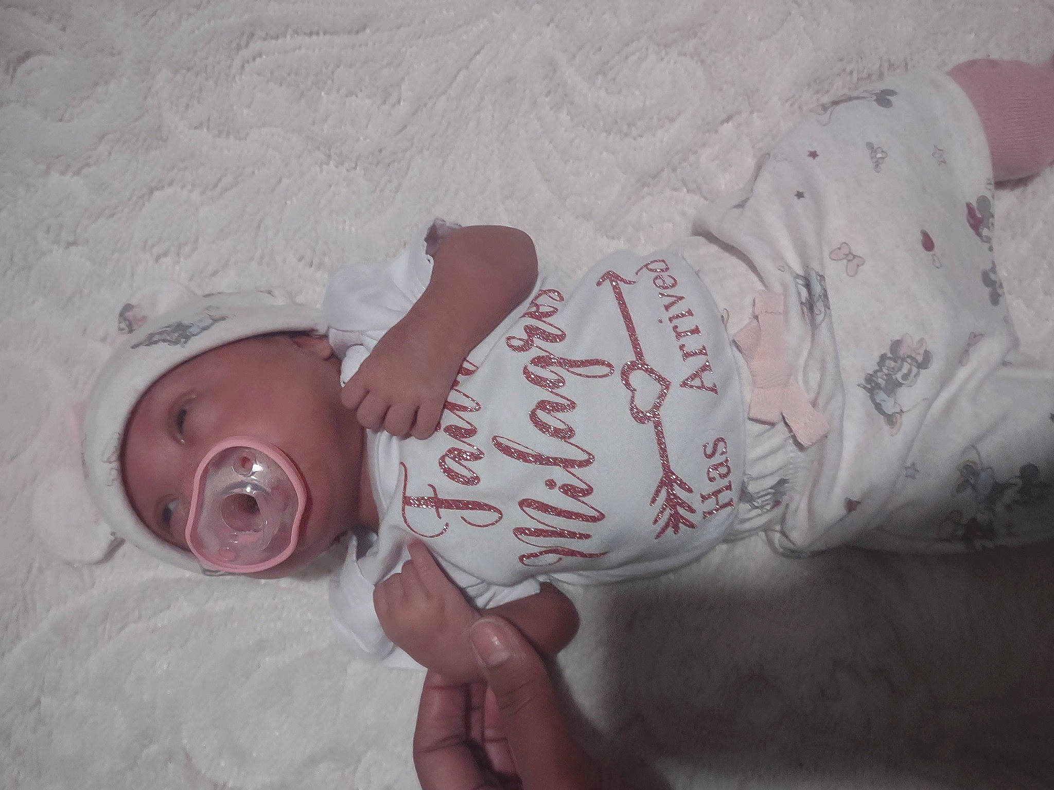 Faith is registered to the contest to win money with this photo: baby, baby_products, baby_toddler_clothing, child, comfort, elbow, eye, face, finger, flesh, head, linens, nail, pattern, person, pink, skin, sleeve, thumb, toddler