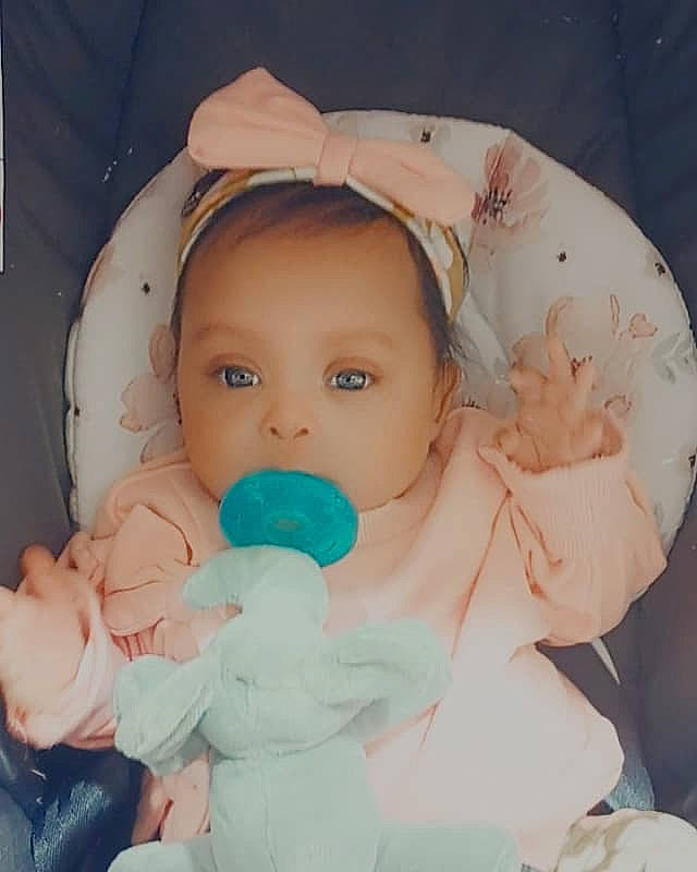 Faith joined the competition — help win amazing prizes! baby, baby_safety, baby_sleeping, baby_toddler_clothing, cheek, chin, comfort, eye, finger, gesture, head, human_body, infant_bed, iris, mouth, nose, person, pink, skin, toddler