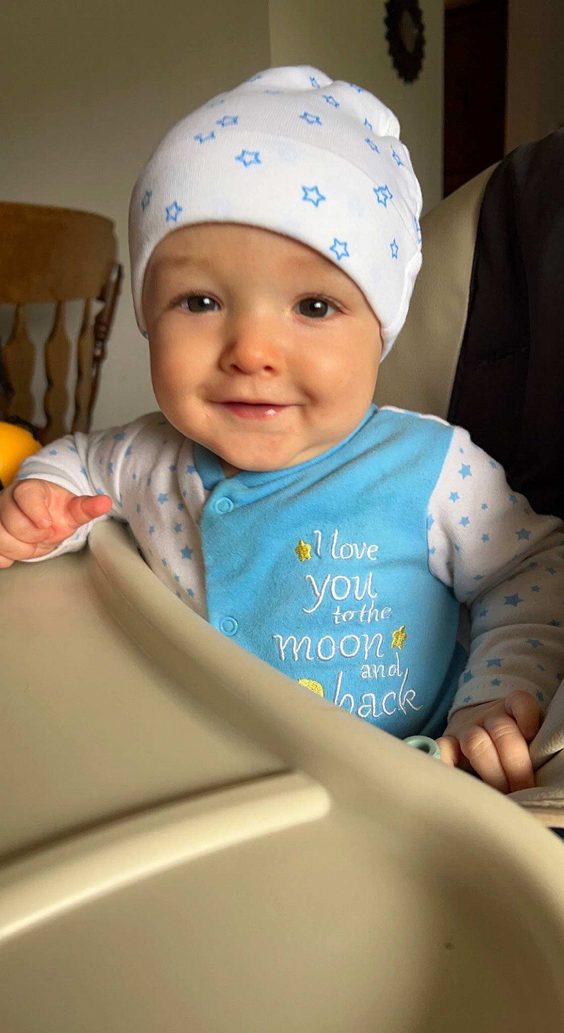 Jimmy is registered to the contest to win money with this photo: baby, baby_products, baby_toddler_clothing, cap, cheek, child, comfort, eye, facial_expression, fashion_accessory, finger, fun, happy, head, headwear, joy, person, product, skin, sleeve