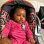 Serenity joined the competition — help win amazing prizes! baby, child, infant, car_seat, pink_clothing, minnie_mouse, onesie, patterned_fabric, hand_holding, pigtails, indoors, portrait, cute, toddler, seated, young_child, soft_lighting, close_up, person, face