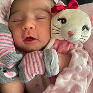 Semaj is registered to the contest to win money with this photo: baby, sleeping, plush_toy, cat_toy, blanket, mittens, pink, gray, infant, closeup, cute, soft, warm, rest, child, adorable, face, cozy, newborn, peaceful