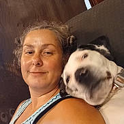 Haejlo joined the competition — help win amazing prizes! woman, adult_female, dog, pet, selfie, couch, indoor, portrait, closeup, collar, motion_blur, cozy, smiling, companionship, relaxed, tank_top, hair, head, face, playful