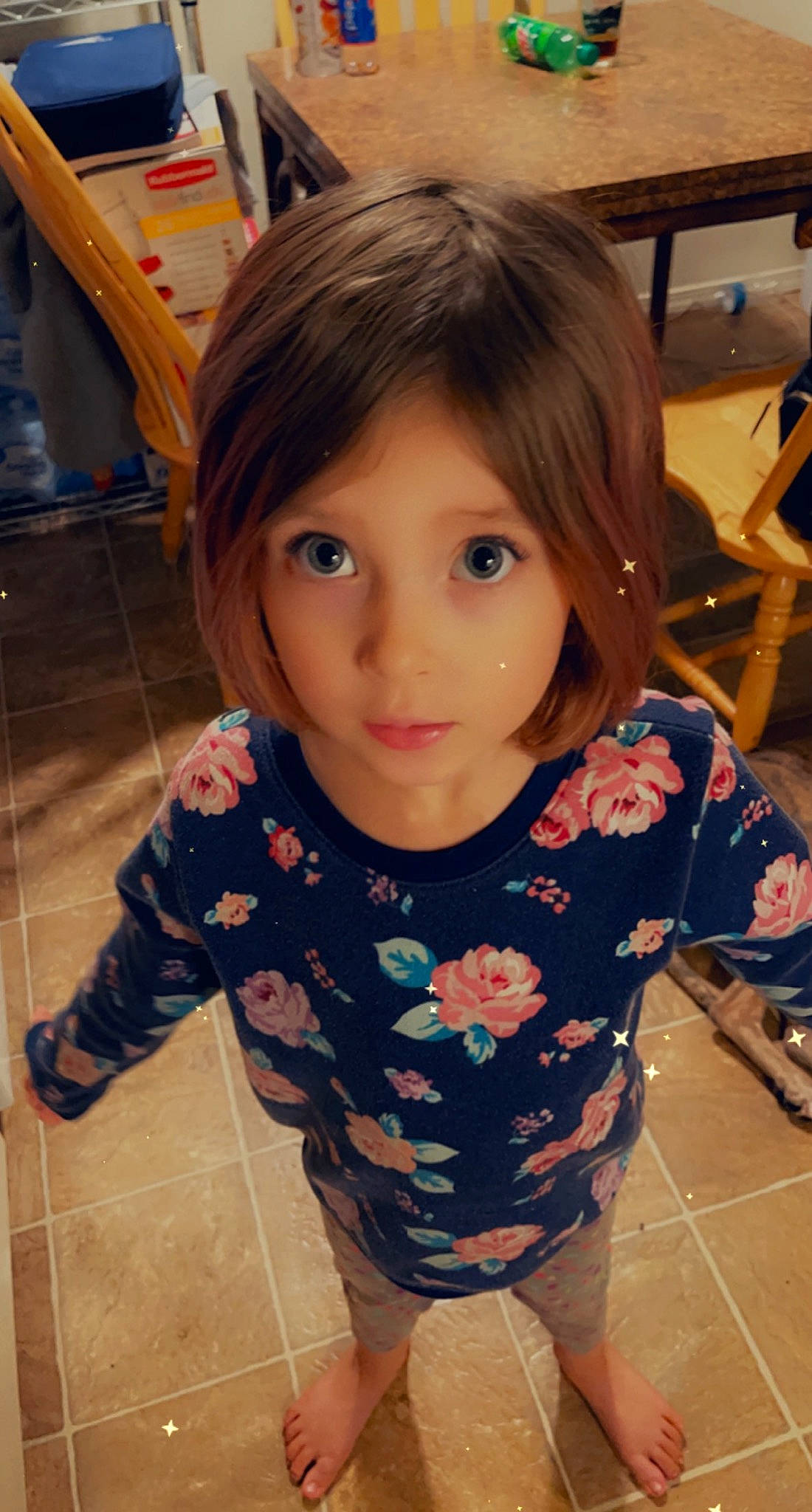 Amia is registered to the contest to win money with this photo: bangs, black_hair, chair, cheek, chin, eyelash, finger, flooring, forehead, hair, happy, iris, lip, mouth, neck, nose, person, skin, sleeve, toddler