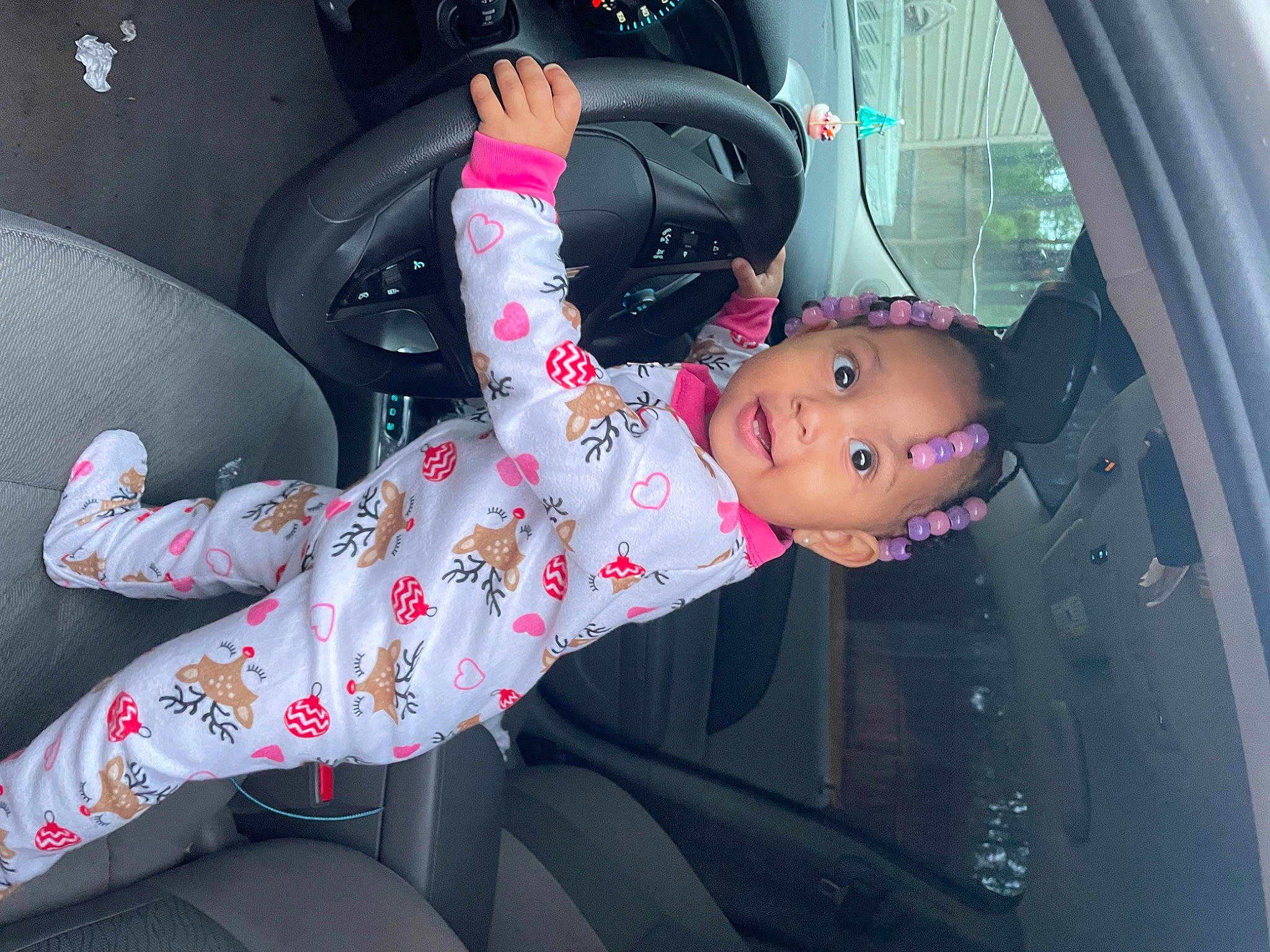 Khalani is registered to the contest to win money with this photo: auto_part, automotive_design, automotive_exterior, car, car_seat, car_seat_cover, carmine, dress, family_car, fun, luxury_vehicle, motor_vehicle, person, pink, steering_wheel, textile, thigh, toy, vehicle, vehicle_door