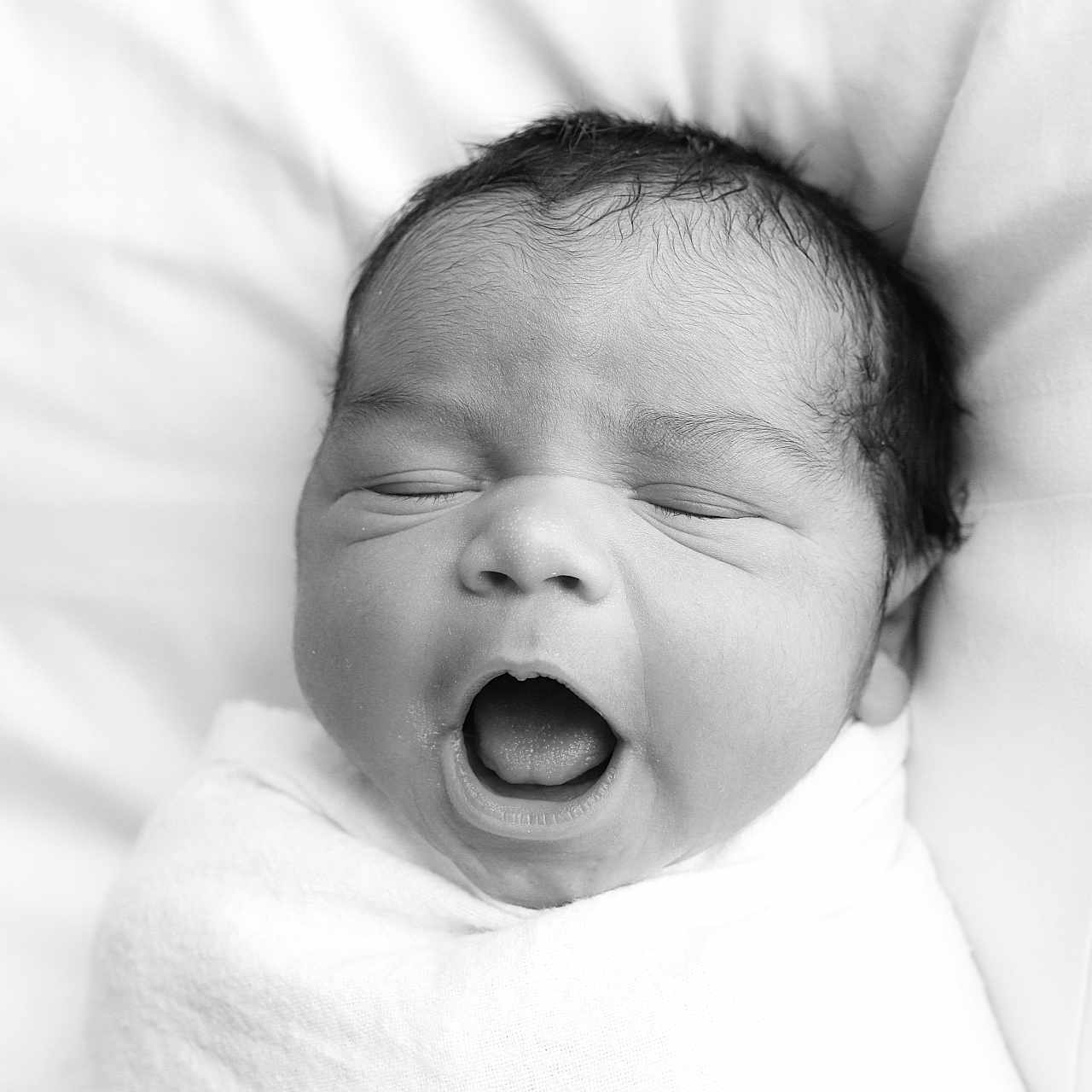 Iqwan is registered to the contest to win money with this photo: baby, bodypart, face, happy, head, laughing, mouth, newborn, person, photography, portrait, yawning