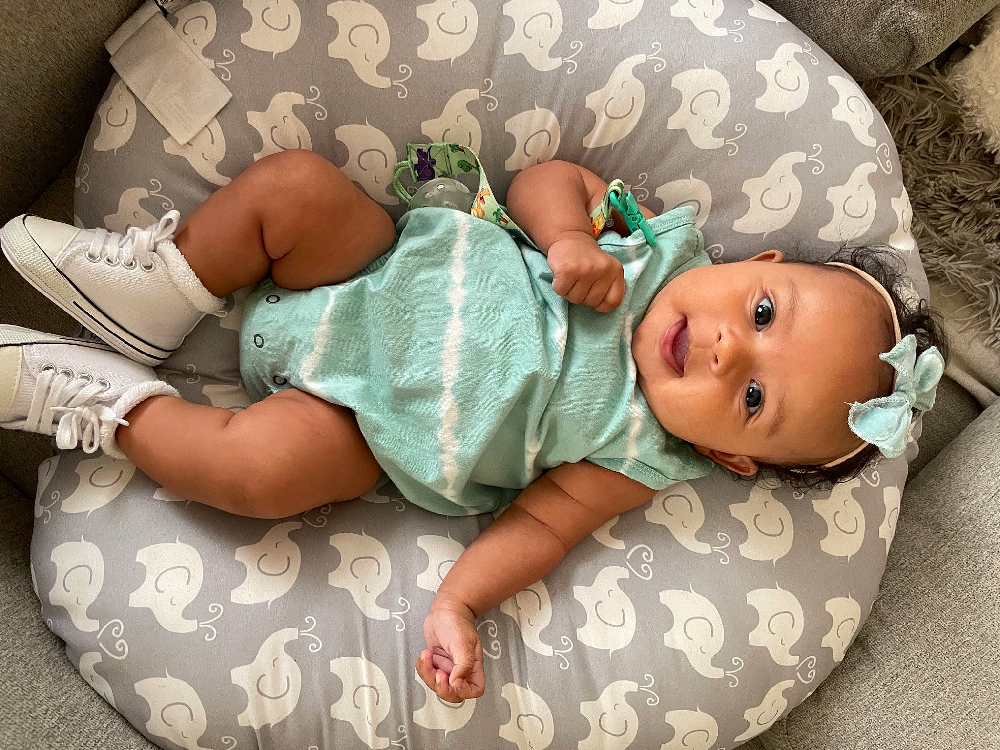 Bella Rae is registered to the contest to win money with this photo: baby, baby_products, baby_safety, baby_sleeping, baby_toddler_clothing, child, comfort, finger, head, headgear, human_body, leg, linens, pattern, person, product, skin, sleeve, sock, textile