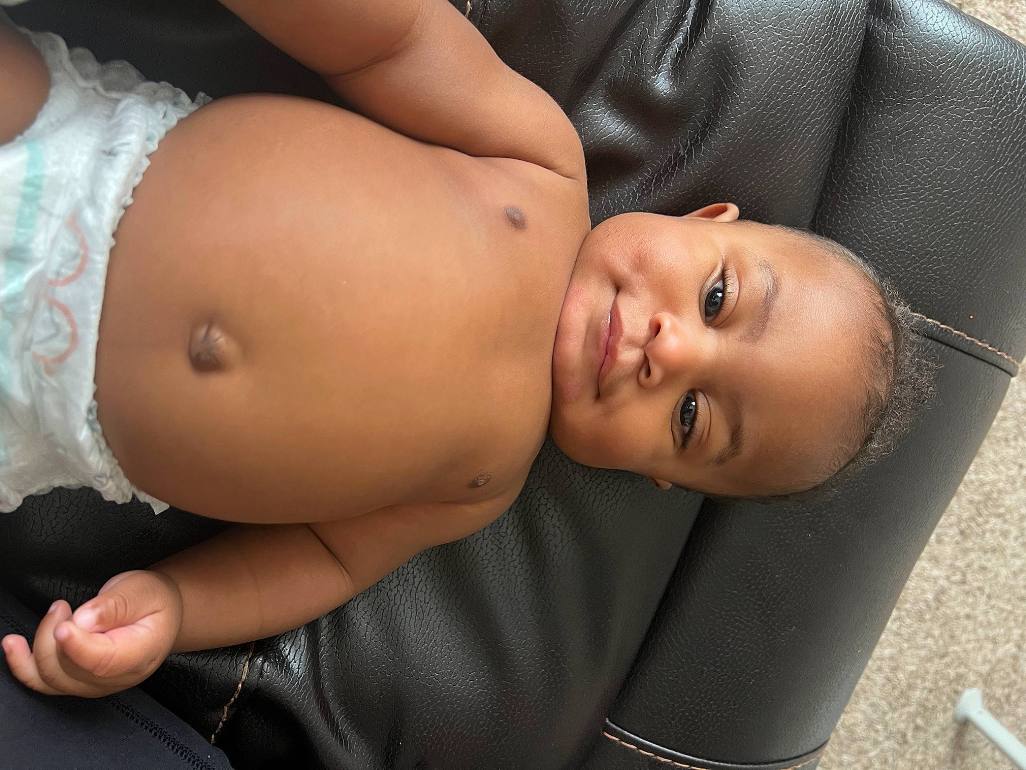 Javion is registered to the contest to win money with this photo: abdomen, baby, chest, comfort, elbow, eye, gesture, glasses, hand, human_body, joint, joy, navel, neck, person, skin, stomach, thigh, toddler, trunk