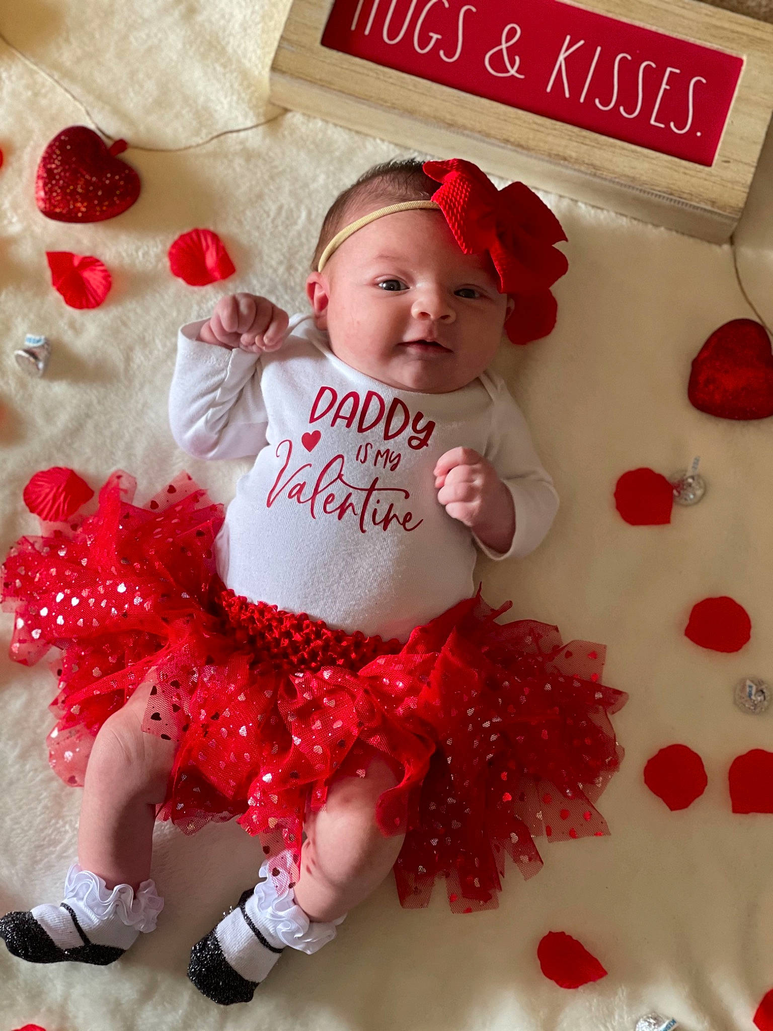 Emmalee joined the competition — help win amazing prizes! baby, baby_toddler_clothing, child, design, embellishment, fashion_accessory, font, happy, headgear, magenta, pattern, peach, person, pink, product, red, ruffle, sleeve, textile, toddler