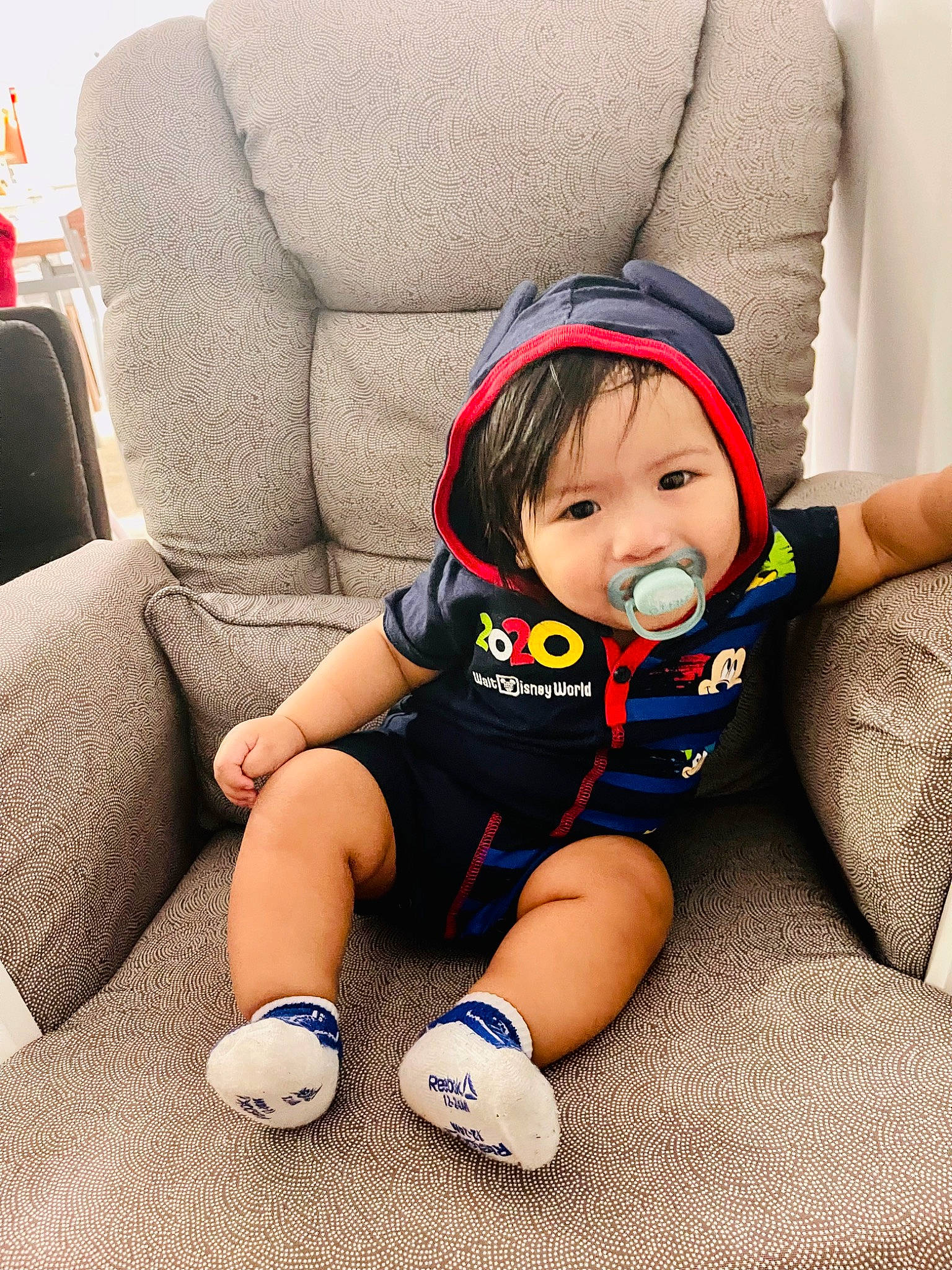 John Mason joined the competition — help win amazing prizes! baby, baby_products, baby_sleeping, baby_toddler_clothing, chair, child, comfort, eye, foot, happy, human_body, human_leg, knee, lap, leg, person, sitting, skin, sock, thigh