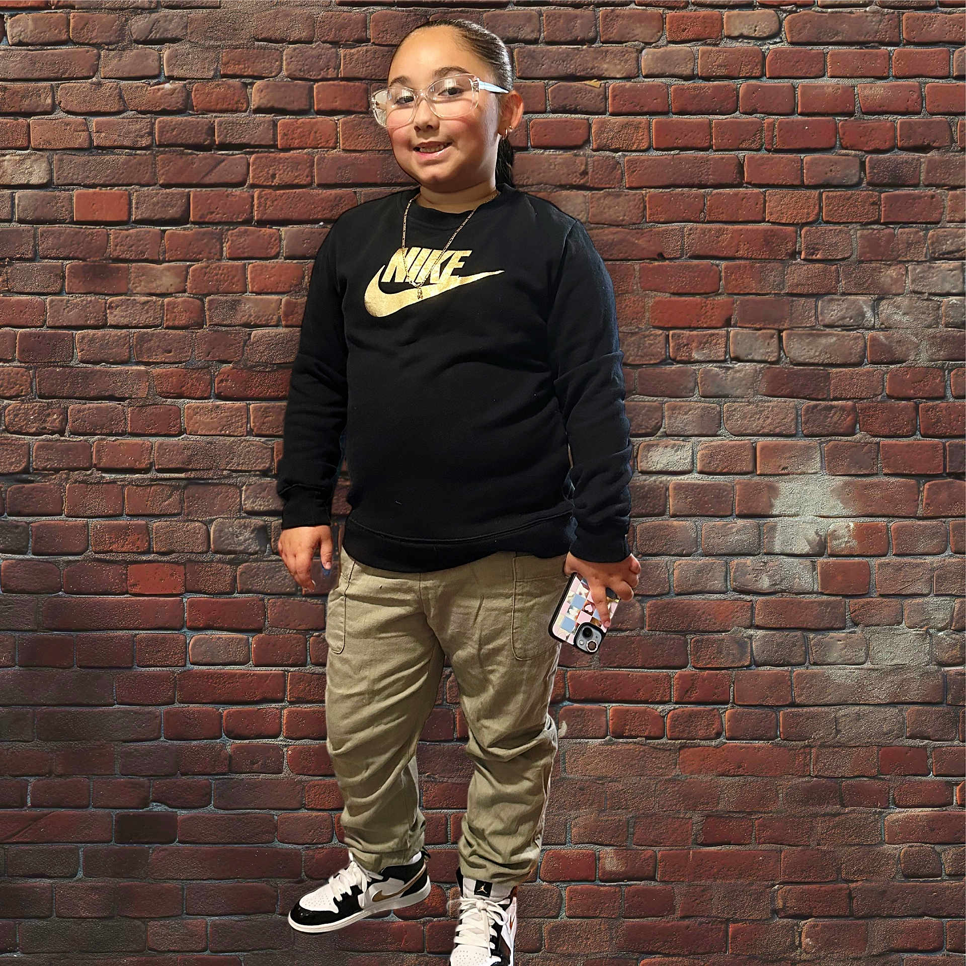 Mariana joined the competition — help win amazing prizes! accessories, architecture, boy, brick, building, clothing, face, footwear, head, jewelry, male, necklace, pants, person, shoe, sleeve, sneaker, standing, teen, wall