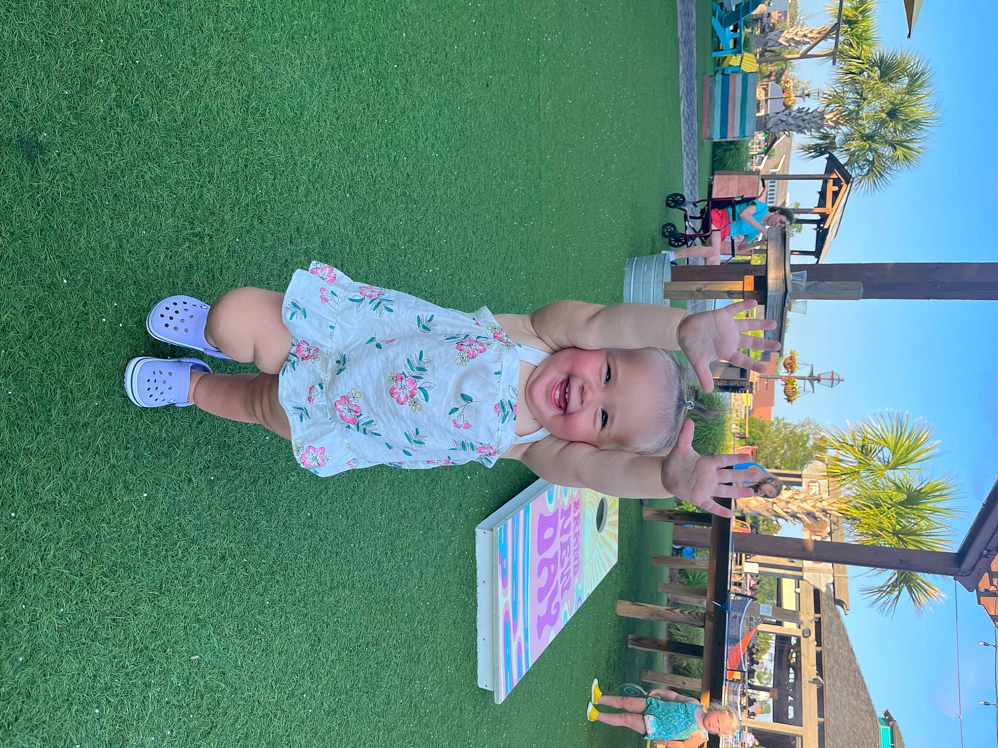 Addison joined the competition — help win amazing prizes! baby, blue, child, fun, grass, house, joy, leisure, line, pattern, person, plant, play, recreation, room, sky, summer, toddler, tree, vacation