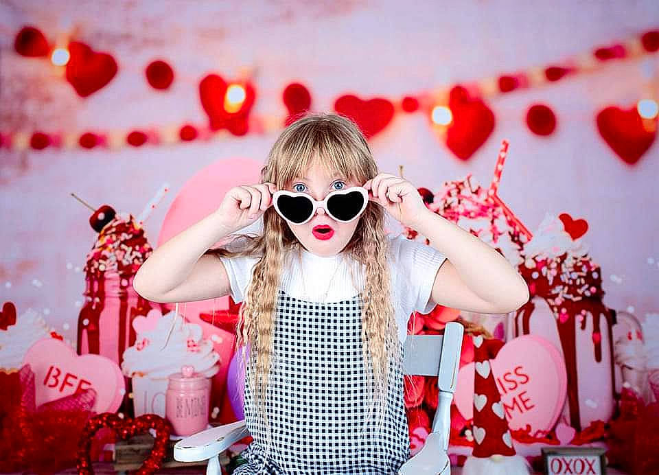 Haley is registered to the contest to win money with this photo: bag, entertainment, event, eyewear, fashion_accessory, fashion_design, fun, glasses, happy, luggage_and_bags, magenta, music, pattern, performing_arts, person, petal, pink, red, sleeve, sunglasses