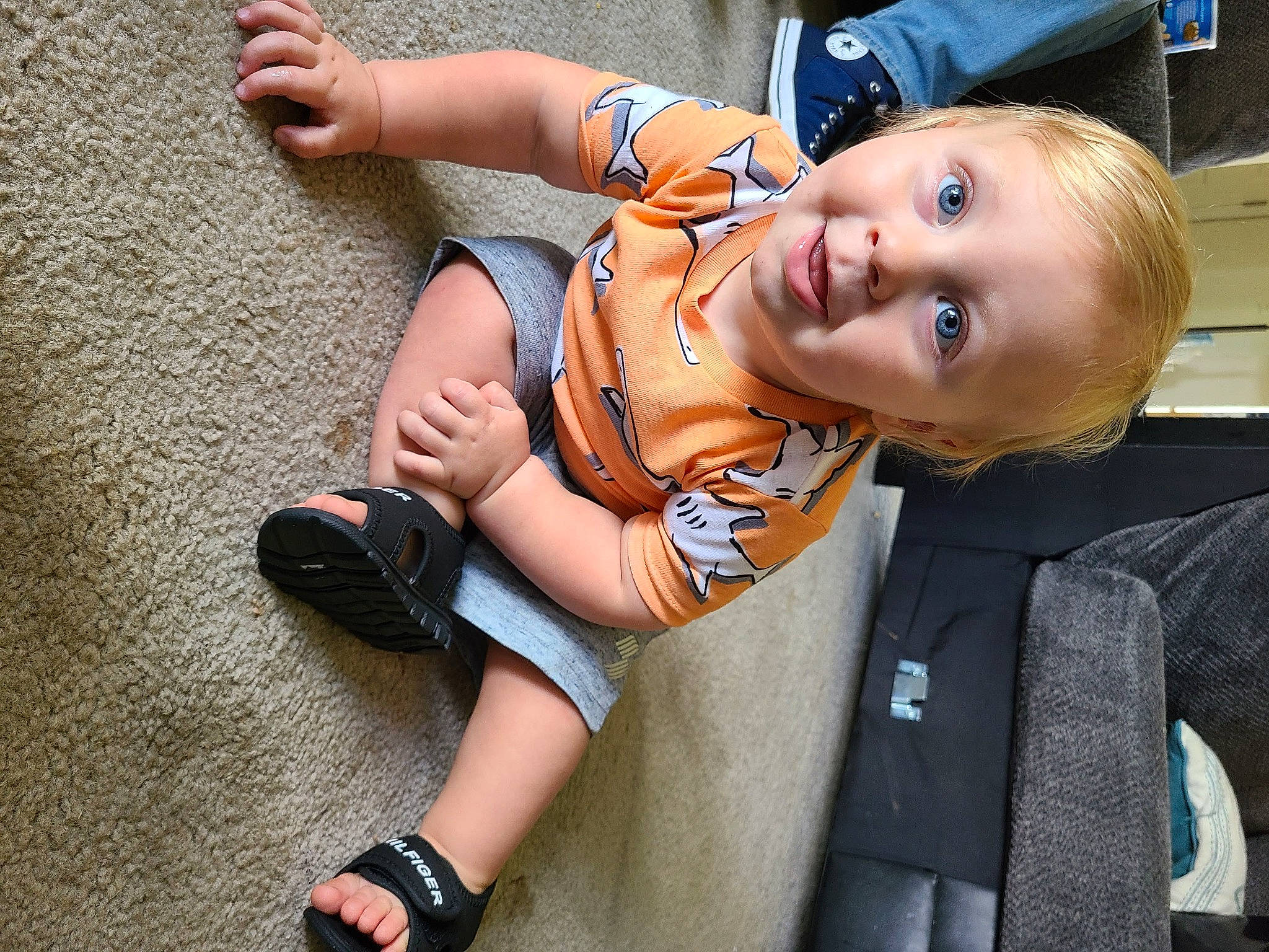 Beau is registered to the contest to win money with this photo: baby, child, elbow, electric_blue, eyewear, foot, fun, hand, happy, human_leg, joint, knee, leg, people, person, sandal, smile, sneakers, suit, thigh