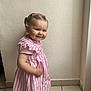 Lyha participe au concours pour gagner de l'argent avec cette photo : baby, child, cute, fashion, girl, happy, indoor, person, pigtails, pink_dress, portrait, shoes, short_sleeves, smile, standing, striped_dress, tile_floor, toddler, wall, young