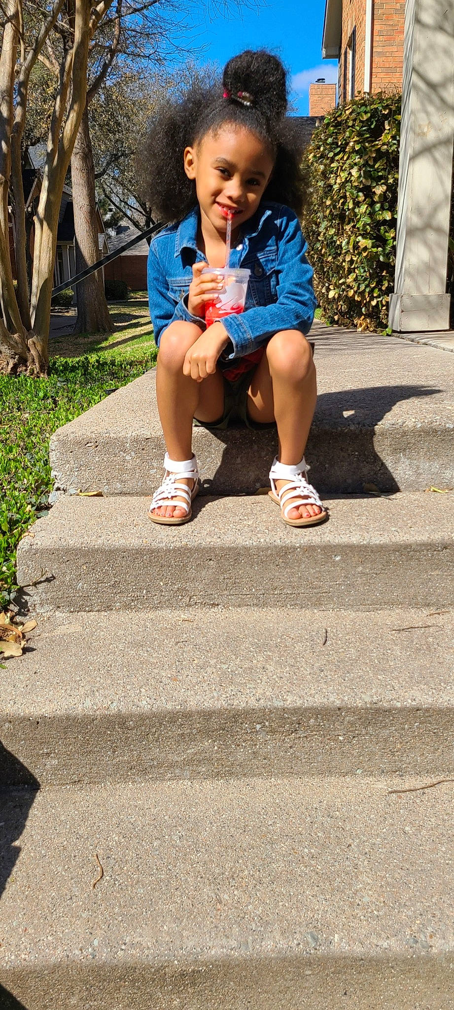 August is registered to the contest to win money with this photo: asphalt, barefoot, electric_blue, foot, gesture, grass, happy, hat, human_body, human_leg, joy, leisure, pedestrian, person, recreation, road, road_surface, sidewalk, thigh, thumb