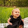 baby, black_dress, blanket, child, cute, daylight, grass, greenery, happy, nature, outdoor, pigtails, playful, portrait, sandals, sitting, smiling, sunlight, toddler, young_child