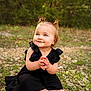 Avangeline is registered to the contest to win money with this photo: black_dress, butterfly, child, clapping, cute, grass, greenery, happy, nature, outdoor, person, pigtails, playful, portrait, rocks, sandals, smiling, sunlight, toddler, young_child