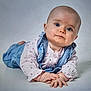 Ruby-Rose joined the competition — help win amazing prizes! baby, background, blue_eyes, child, clothing, cute, denim_overalls, expression, face, floral_shirt, hands, head, infant, looking, lying_down, person, portrait, skin, studio, toddler