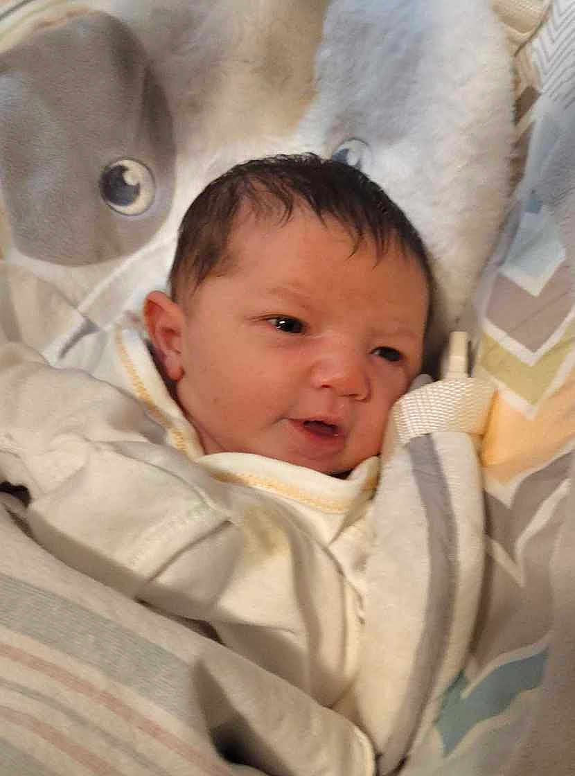 Trinity joined the competition — help win amazing prizes! baby, newborn, blanket, soft, sleepy, face, infant, clothing, cozy, head, cute, wrapped, indoors, child, portrait, comfort, warm, young, resting, closeup