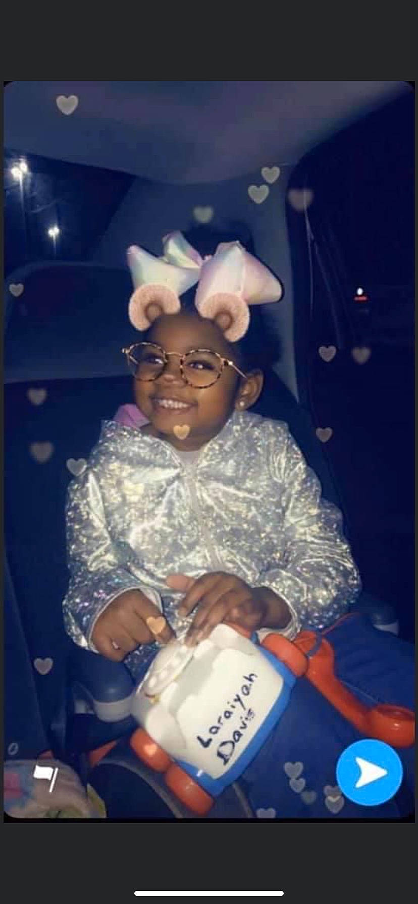Laraiyah joined the competition — help win amazing prizes! baby, balloon, child, event, eyewear, fun, glasses, happy, headwear, human_body, joy, magenta, party_supply, person, plastic, sitting, smile, sunglasses, toddler, vision_care