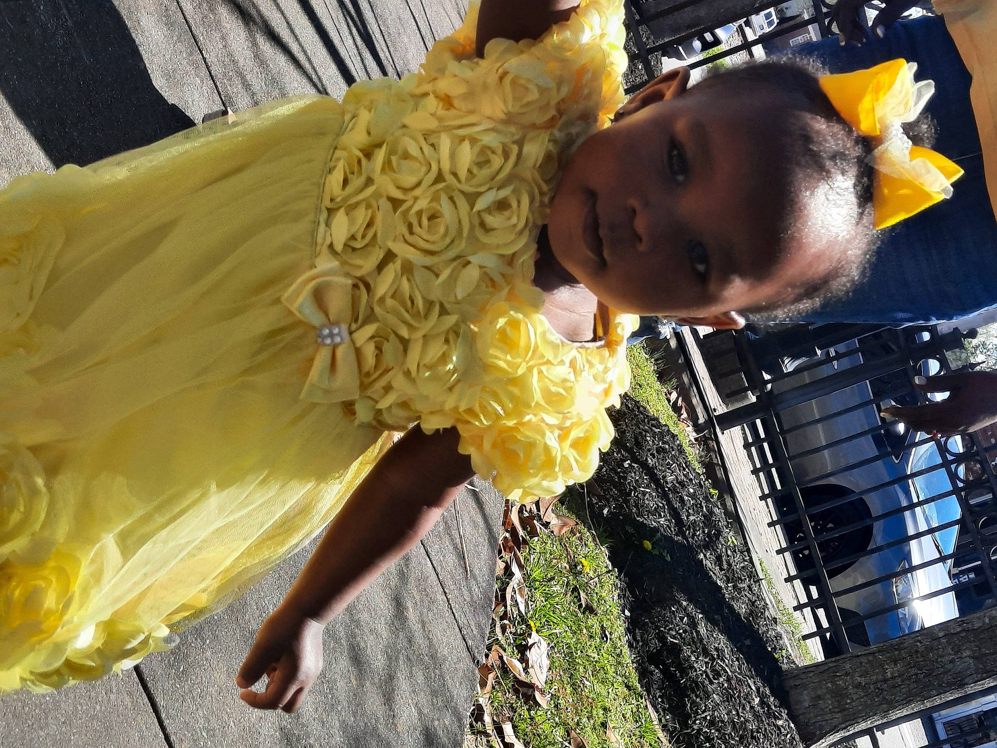 Janiya is registered to the contest to win money with this photo: ceremony, child, costume, cut_flowers, event, fashion_accessory, fashion_design, floral_design, floristry, flower_arranging, formal_wear, fun, hairstyle, happy, human_leg, person, plant, public_event, textile, tradition