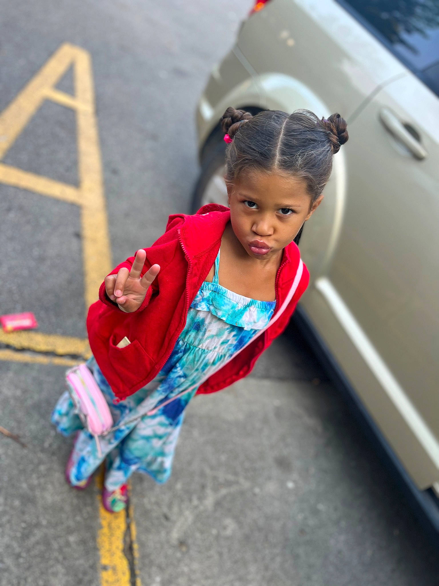 Zaniyah is registered to the contest to win money with this photo: asphalt, automotive_design, automotive_exterior, automotive_lighting, automotive_tire, bumper, car, child, electric_blue, face, family_car, fun, happy, leisure, motor_vehicle, person, road, street, toddler, travel