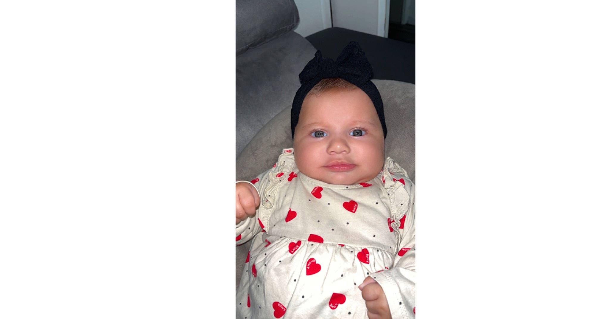 Souhayla participe au concours pour gagner de l'argent avec cette photo : baby, baby_products, baby_toddler_clothing, cheek, child, collar, dress, eyebrow, fun, happy, lip, magenta, nose, pattern, person, portrait_photography, sitting, sleeve, smile, t_shirt