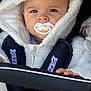 Eliana participe au concours pour gagner de l'argent avec cette photo : baby, baby_hand, black_straps, car_seat, child, closeup, clothing, cute, expression, face, hooded_jacket, indoor, infant, pacifier, person, pink_blanket, portrait, warm_clothing, white_fur, young_child