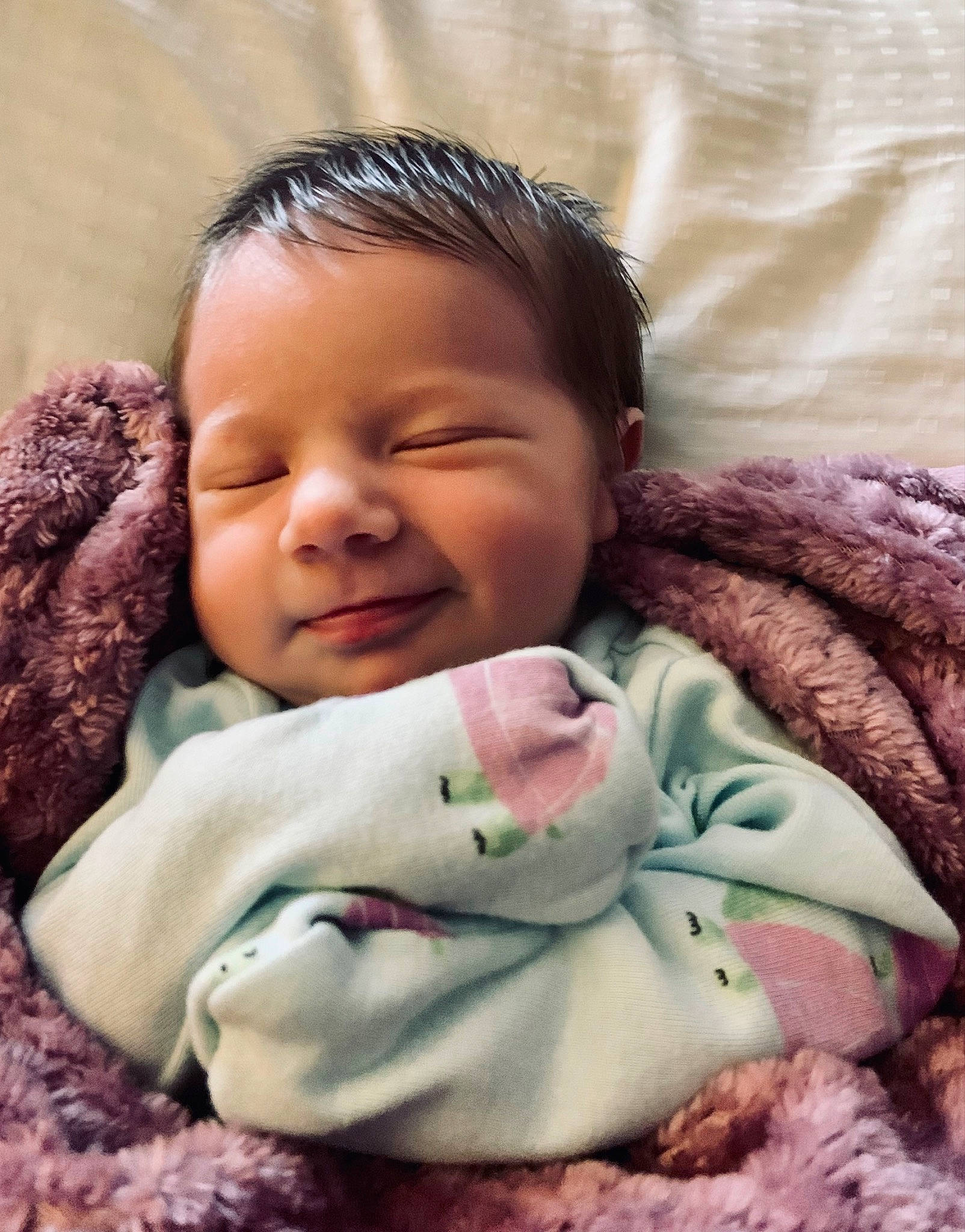 Olivia is registered to the contest to win money with this photo: baby, cheek, child, comfort, eye, eyebrow, eyelash, face, facial_expression, forehead, happy, head, lip, mouth, nose, person, pink, skin, smile, textile