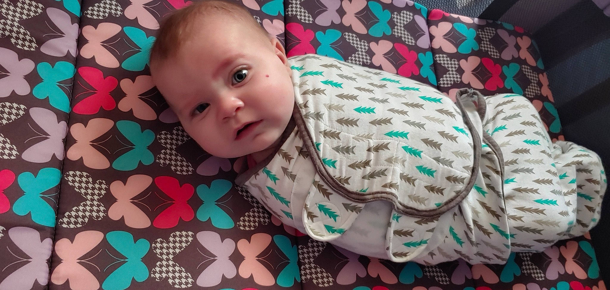 Kinley joined the competition — help win amazing prizes! baby, baby_toddler_clothing, cheek, child, comfort, dress, eye, flooring, happy, head, iris, linens, pattern, person, pink, plaid, product, skin, sleeve, textile