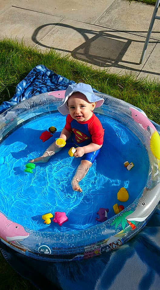 Caelan joined the competition — help win amazing prizes! amusement_park, baby_float, baby_products, child, fun, inflatable, leisure, outdoor_play_equipment, person, play, pool, product, recreation, summer, swimming_pool, toddler, vacation, water, water_park