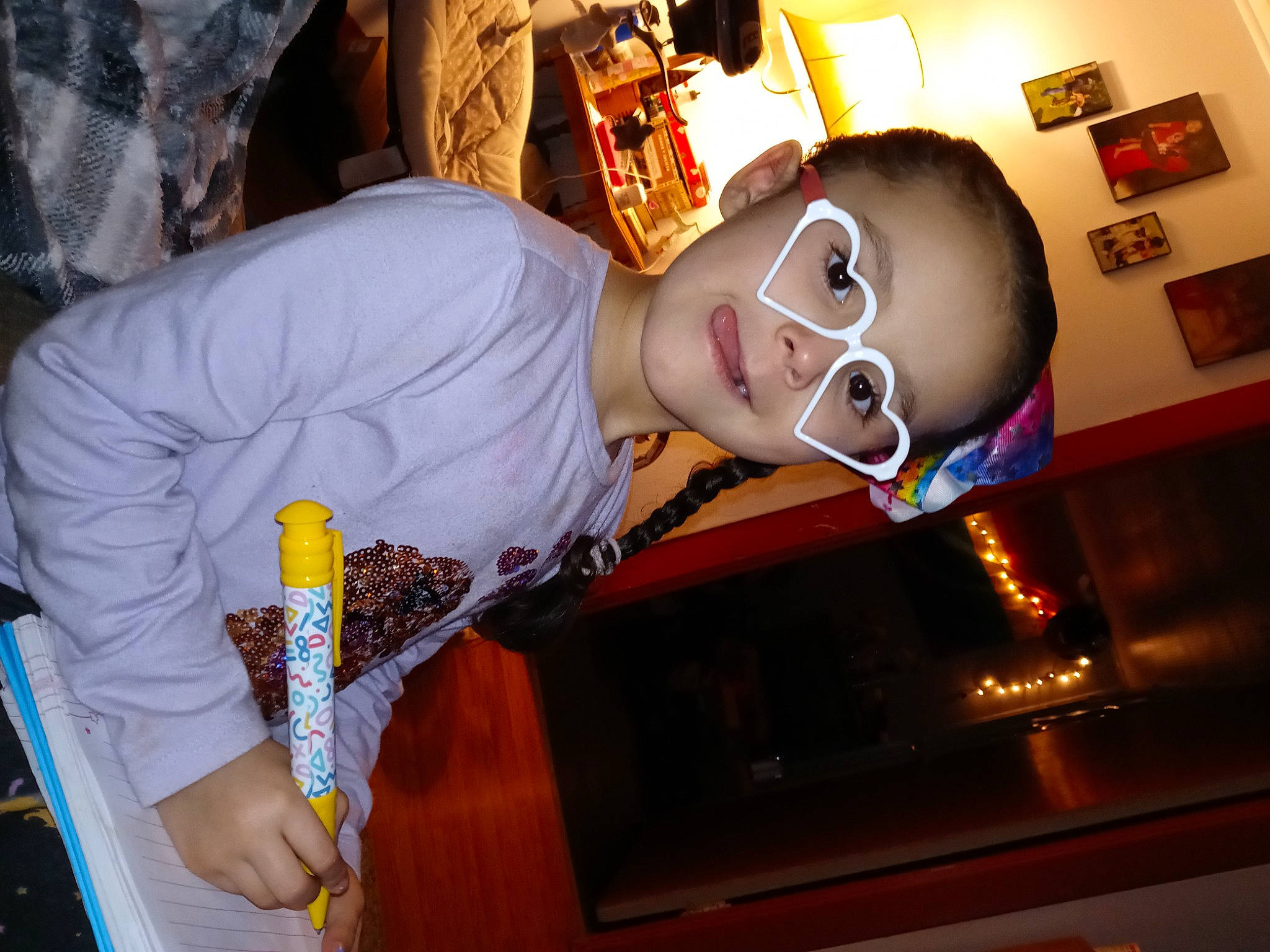 Kamariah joined the competition — help win amazing prizes! art, eyewear, fashion_design, flash_photography, fun, hat, joy, person, room, table, visual_arts, wood, wrist