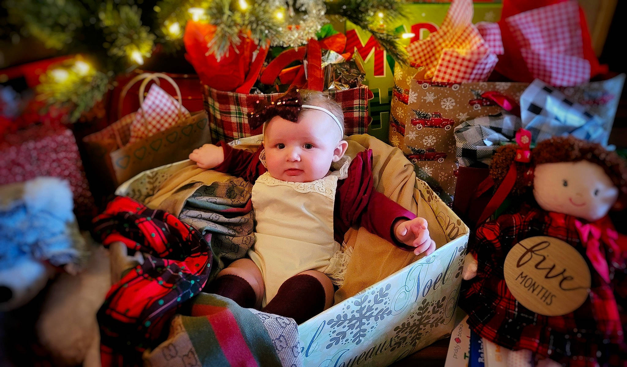 Stella joined the competition — help win amazing prizes! baby, child, christmas_eve, christmas_ornament, doll, dress, event, fun, happy, holiday, human_settlement, ornament, person, pink, public_space, sitting, stuffed_toy, textile, toy, tradition