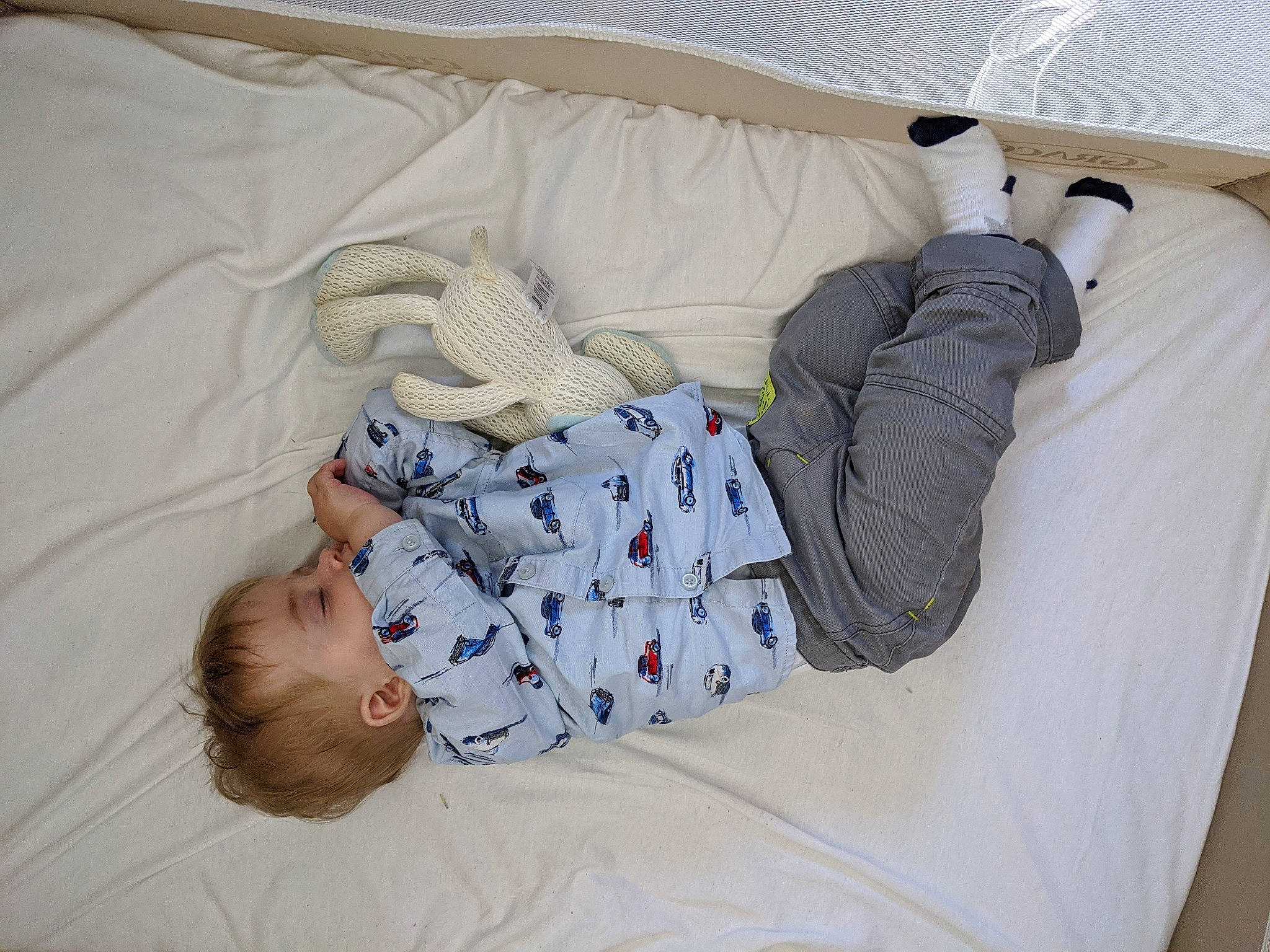 Hugo Valentine is registered to the contest to win money with this photo: baby, child, comfort, linens, nap, person, product, room, sleep