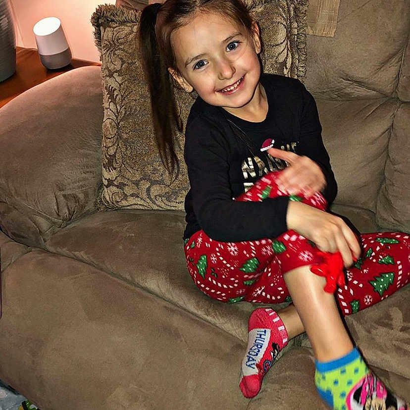 Sophia Marie is registered to the contest to win money with this photo: child, child_model, headwear, joy, leg, person, photography, sitting, smile