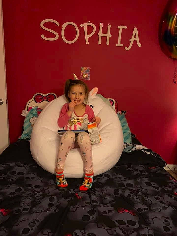 Sophia Marie is registered to the contest to win money with this photo: furniture, joy, person, sitting