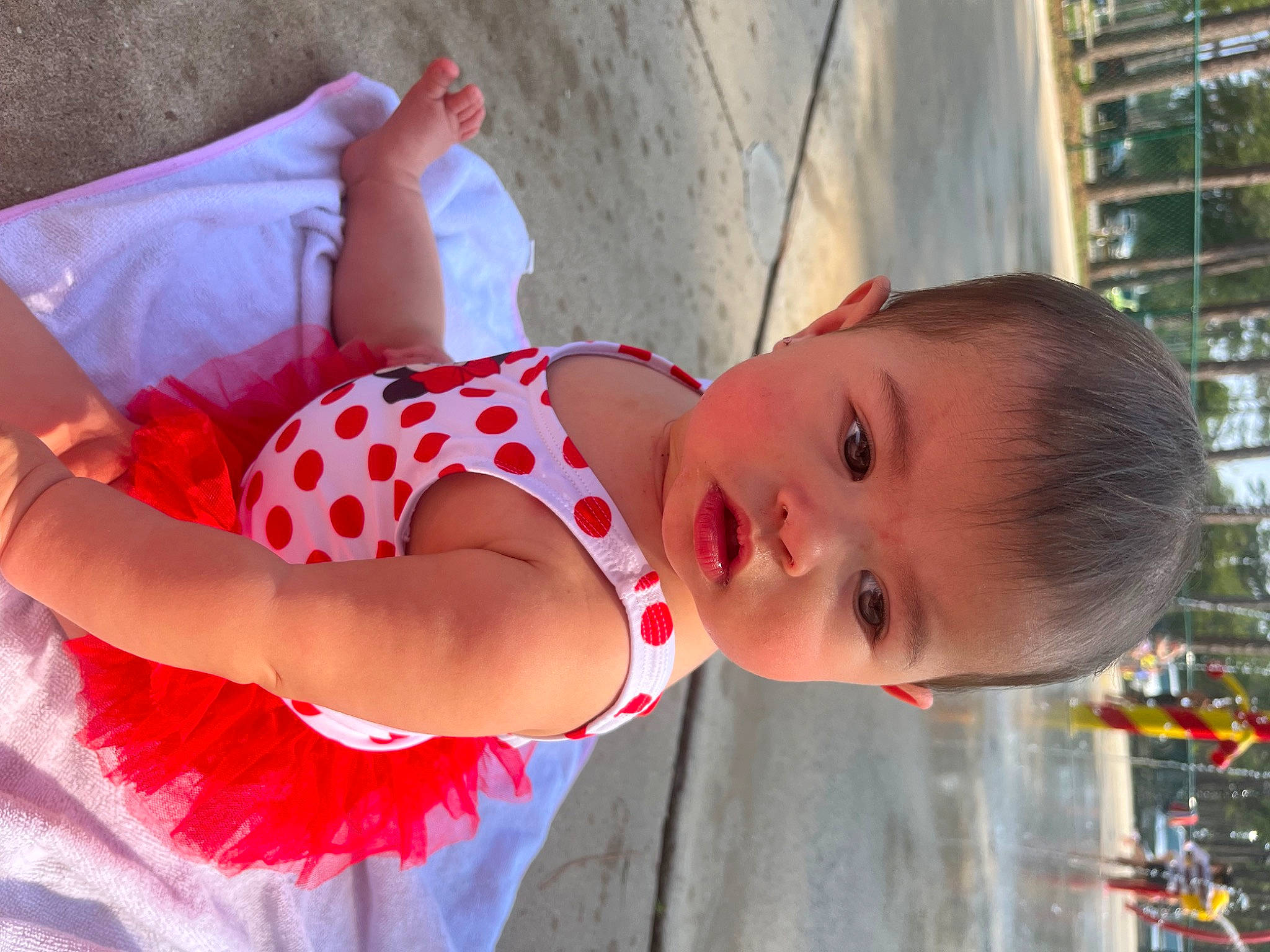 Claudia is registered to the contest to win money with this photo: abdomen, baby, baby_toddler_clothing, child, dress, event, fun, happy, human_body, human_leg, leisure, pattern, person, smile, toddler, tree, vacation